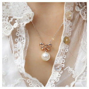 Sweet Ribbon Pendant with Fashion Pearl and Necklace