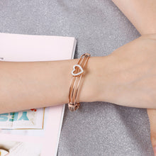 Load image into Gallery viewer, Simple and Fashion Plated Rose Gold Hollow Heart-shaped 316L Stainless Steel Bangle with Cubic Zirconia