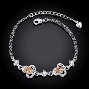 Simple and Fashion Three-leafed Clover Champagne Cubic Zircon Bracelet - Glamorousky