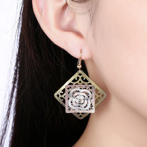Fashion Elegant Plated Gold Hollow Flower Geometric Earrings - Glamorousky