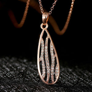 Simple Fashion Plated Rose Gold Hollow Water Drop Pendant with Cubic Zircon and Necklace - Glamorousky