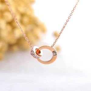 Fashion Simple Plated Rose Gold Titanium Steel Hollow Heart Geometric Round Necklace with Cubic Zircon - Glamorousky
