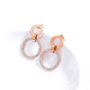 Simple and Fashion Plated Rose Gold Roman Numerals Geometric Hollow Round Titanium Steel Earrings with Cubic Zircon - Glamorousky