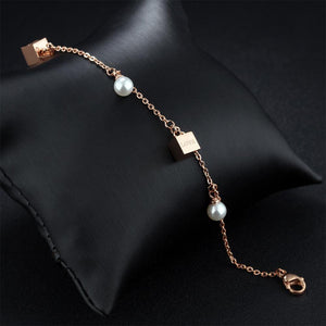 Simple and Elegant Plated Rose Gold Geometric Square Pearl Titanium Steel Bracelet - Glamorousky