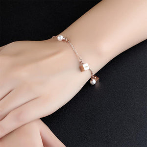 Simple and Elegant Plated Rose Gold Geometric Square Pearl Titanium Steel Bracelet - Glamorousky