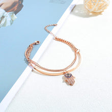 Load image into Gallery viewer, Fashion Plated Rose Gold Fatima Bracelet with Blue Cubic Zirconia - Glamorousky