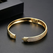 Load image into Gallery viewer, Fashion Simple Plated Gold Geometric Oval Cubic Zirconia Bangle