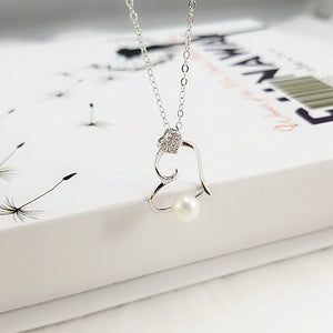 925 Sterling Silver Simple Romantic Hollow Heart-shaped White Freshwater Pearl Pendant with Cubic Zirconia and Necklace