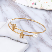Load image into Gallery viewer, Fashion Simple Plated Gold Couple Cartoon Character Imitation Pearl 316L Stainless Steel Bangle