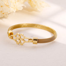 Load image into Gallery viewer, Simple and Elegant Plated Gold Hollow Four-leafed Clover 316L Stainless Steel Bangle