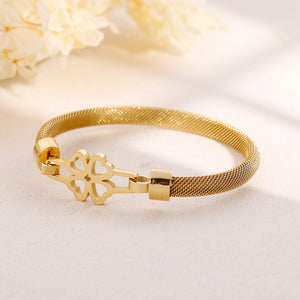 Simple and Elegant Plated Gold Hollow Four-leafed Clover 316L Stainless Steel Bangle