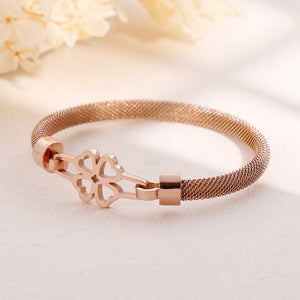 Simple and Elegant Plated Rose Gold Hollow Four-leafed Clover 316L Stainless Steel Bangle