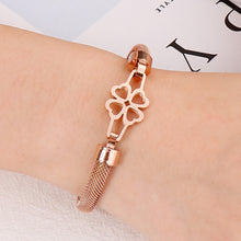 Load image into Gallery viewer, Simple and Elegant Plated Rose Gold Hollow Four-leafed Clover 316L Stainless Steel Bangle