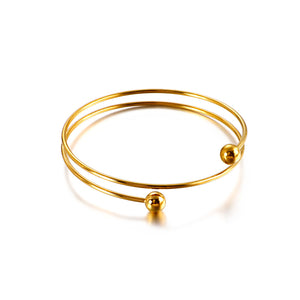 Simple and Fashion Plated Gold Spiral Geometric Round 316L Stainless Steel Bangle