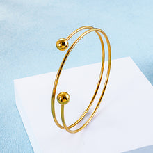 Load image into Gallery viewer, Simple and Fashion Plated Gold Spiral Geometric Round 316L Stainless Steel Bangle