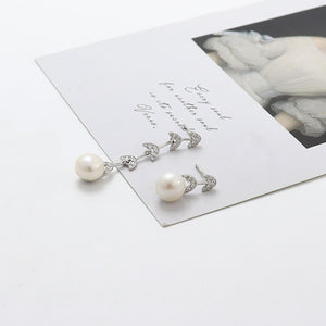 925 Sterling Silver Fashion Simple Leaf Tassel White Freshwater Pearl Earrings with Cubic Zirconia