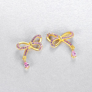925 Sterling Silver Plated Gold Simple and Cute Ribbon Stud Earrings with Pink Cubic Zirconia