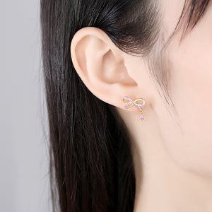 925 Sterling Silver Plated Gold Simple and Cute Ribbon Stud Earrings with Pink Cubic Zirconia