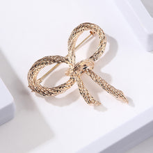 Load image into Gallery viewer, Simple and Fashion Plated Gold Ribbon Brooch