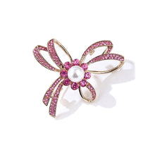 Load image into Gallery viewer, Simple and Fashion Plated Gold Ribbon Imitation Pearl Brooch with Pink Cubic Zirconia