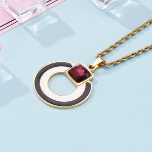 Fashion Simple Plated Gold Hollow Geometric Round 316L Stainless Steel Pendant with Red Cubic Zirconia and Necklace