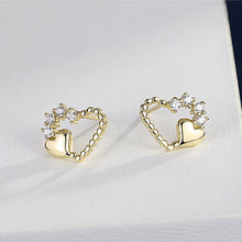 Load image into Gallery viewer, 925 Sterling Silver Plated Gold Simple and Fashion Hollow Heart-shaped Stud Earrings with Cubic Zirconia