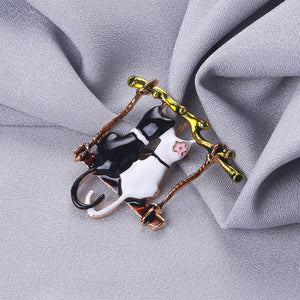 Fashion and Lovely Plated Gold Enamel Black and White Double Cat Brooch