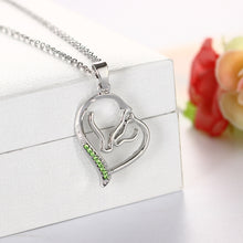 Load image into Gallery viewer, Fashion and Elegant Double Horse Head Heart Pendant with Green Cubic Zirconia and Necklace