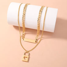 Load image into Gallery viewer, Fashion Simple Plated Gold Hollow Heart Lock Geometric Pendant with Double Layer Necklace