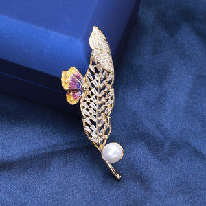 Fashion Simple Plated Gold Hollow Leaf Enamel Purple Butterfly Imitation Pearl Brooch with Cubic Zirconia