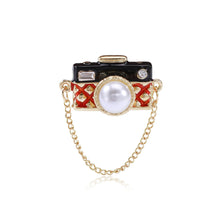 Load image into Gallery viewer, Fashion Creative Plated Gold Camera Tassel Chain Imitation Pearl Brooch