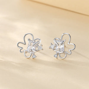 925 Sterling Silver Simple Fashion Hollow Flower Stud Earrings with Cubic Zirconia
