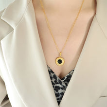 Load image into Gallery viewer, Simple and Elegant Plated Gold 316L Stainless Steel English Alphabet Geometric Round Pendant with Black Cats Eye and Necklace