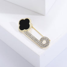 Load image into Gallery viewer, Fashion Simple Plated Gold Enamel Black Four-Leafed Clover Paperclip Brooch with Cubic Zirconia