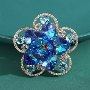 Fashion Brilliant Plated Gold Hollow Flower Brooch with Blue Cubic Zirconia