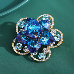 Fashion Brilliant Plated Gold Hollow Flower Brooch with Blue Cubic Zirconia
