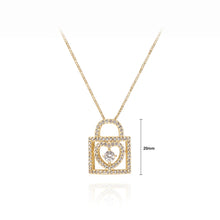 Load image into Gallery viewer, Fashion Simple Plated Gold Hollow Heart Lock Pendant with Cubic Zirconia and Necklace